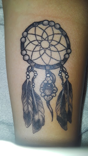 Explore cross forearm tattoo ideas, creative tattoo ideas in San Diego, available at Lavish Tattoo Company