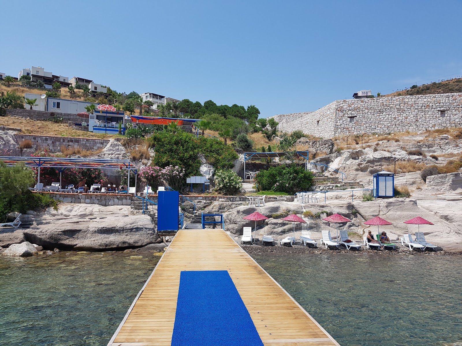 Fotografija Akyarlar beach II z modra čista voda površino