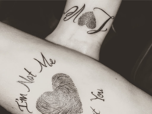 Explore child tattoo ideas for mom, creative tattoo ideas in Powderly, available at Best Ink Tattoo Studio
