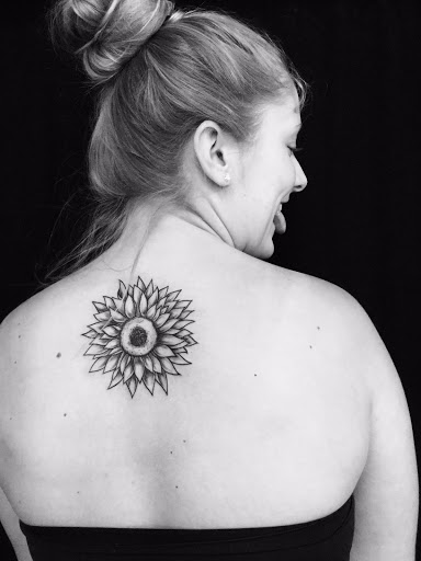 Find book of tattoo ideas for your next unique tattoo in Emporia at Monarch Tattoo