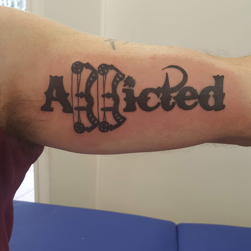 Explore roman numeral tattoo ideas, creative tattoo ideas in Owensboro, available at Lady Luck Tattoo and Body Piercing