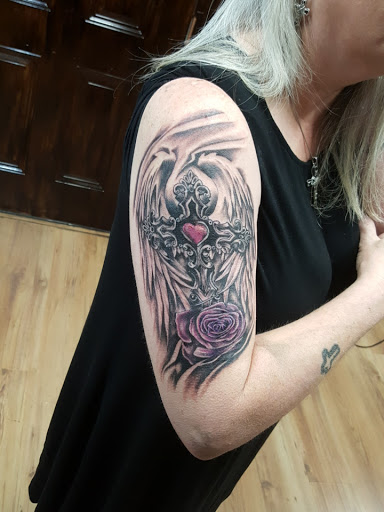 Explore dog nose print tattoo ideas, creative tattoo ideas in Harrisburg, available at Rayzor Tattoos