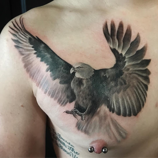 Explore dog nose tattoo ideas, creative tattoo ideas in Ann Arbor, available at Lucky Monkey Tattoo Parlour