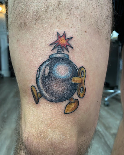 Explore cool guitar tattoo ideas, creative tattoo ideas in Westland, available at Premier Tattoo Company Westland