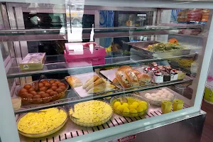 Rangoli Restaurant & Sweets image