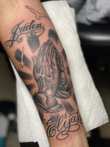 Explore lion sleeve tattoo ideas, creative tattoo ideas in Buffalo, available at Wishful Inking Tattoos & Piercings