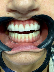 OralCenter Implantes Dr.Fabio Benedetti e Dra. Marieli Tomasi - Dentista