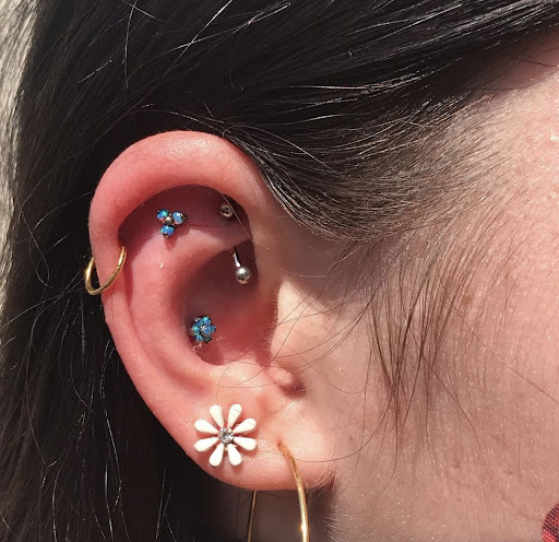 Explore feminine tattoo sleeve ideas, creative tattoo ideas in San Diego, available at Luna Studio Body Piercings & Tooth gems