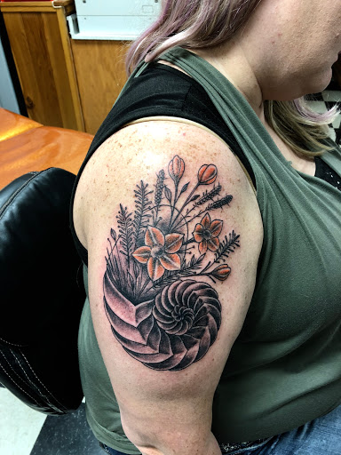 Explore outline tattoo ideas for guys, creative tattoo ideas in Black River Falls, available at Black River Tattoo