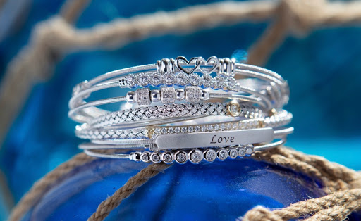 Explore sibling tattoo ideas for 2, creative tattoo ideas in Newton, available at Danas Fine Jewelry, Inc.