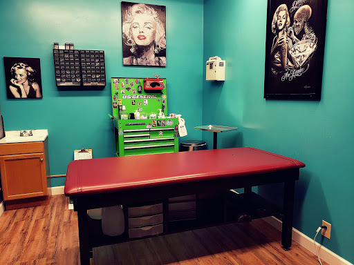 Explore tattoo ideas for chest piece, creative tattoo ideas in Muncie, available at Abandon all hope tattoo and body piercing