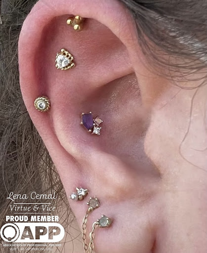 Explore guns n roses tattoo ideas, creative tattoo ideas in Atlanta, available at Virtue and Vice Body Piercing