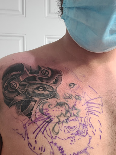 Explore purple flower tattoo ideas, creative tattoo ideas in Odenton, available at Naked Art Tattoos