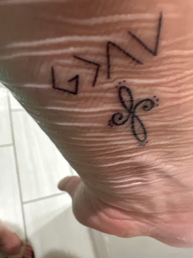 Explore overcome tattoo ideas, creative tattoo ideas in Port Aransas, available at SHARK ATTACK TATTOO