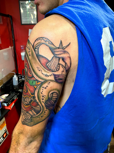 Explore light bulb tattoo ideas, creative tattoo ideas in Lexington, available at LexInk Tattoo