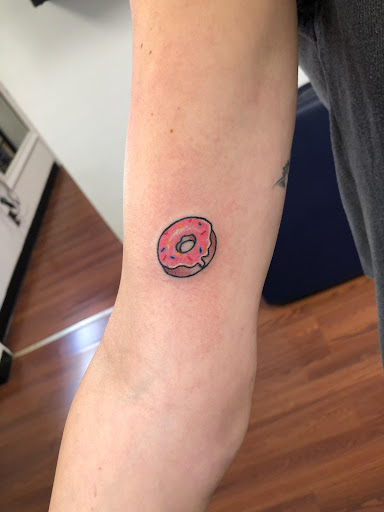 Explore golf ball tattoos ideas, creative tattoo ideas in Aurora, available at Skin of A Different Color