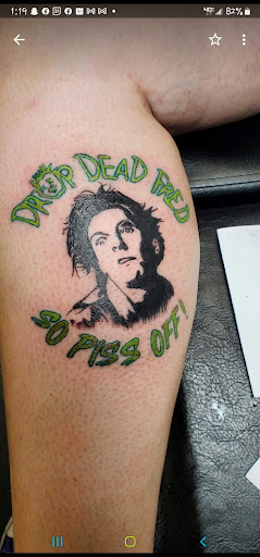 Explore wedding ring tattoo ideas male, creative tattoo ideas in Redding, available at Caddy Daddys