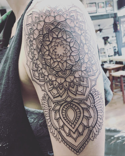 Explore tricep tattoo ideas for men, creative tattoo ideas in Broomfield, available at Ink & Art Collective