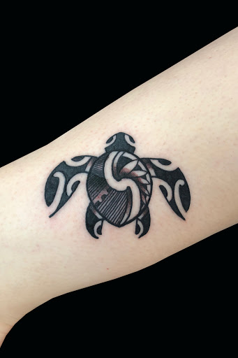 Explore arrowhead tattoo ideas, creative tattoo ideas in Lahaina, available at Sweet Trade Tattoo