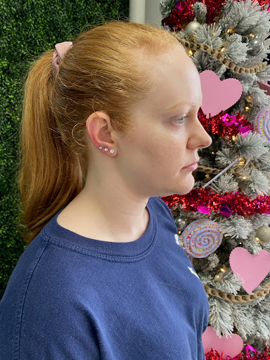 Explore throat tattoo ideas for females, creative tattoo ideas in Conroe, available at Nicoles Tattoos and Piercings