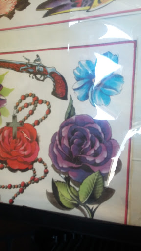 Explore tattoo ideas peacock, creative tattoo ideas in Council Bluffs, available at Lil Bros Tattoo
