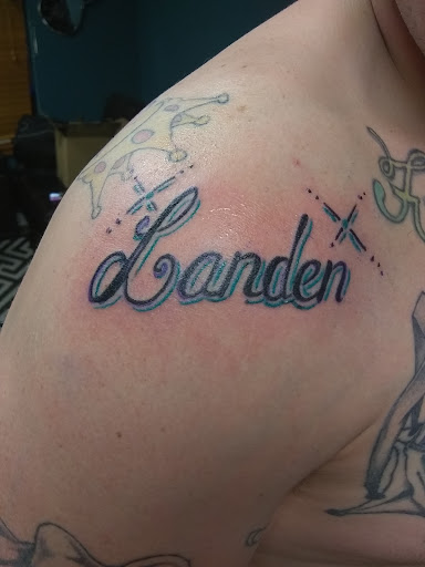 Explore mens spine tattoo ideas, creative tattoo ideas in Omaha, available at A New Creation Tattoo