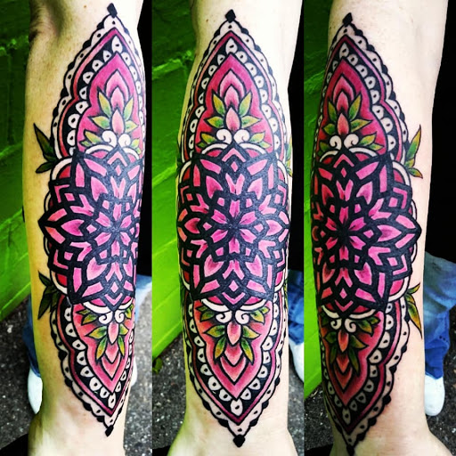 Explore tattoo ideas with flowers and names, creative tattoo ideas in Rochester, available at Vicious Ink Tattoos & Piercing