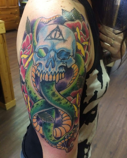 Explore realism tattoo ideas, creative tattoo ideas in Fort Smith, available at Hanging City Body Modification