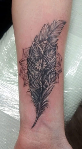 Explore woman arm tattoo ideas, creative tattoo ideas in Hudson, available at Synchronicity Tattoo Studio Llc