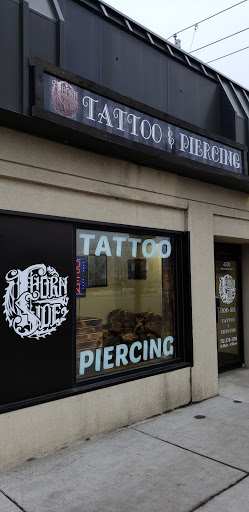 Explore growth tattoo ideas for guys, creative tattoo ideas in Sioux City, available at Thorn-Side Tattoo & Piercing
