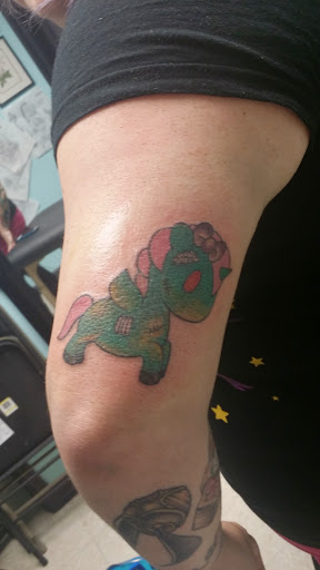 Explore dandelion tattoo ideas, creative tattoo ideas in Chattanooga, available at American Ink