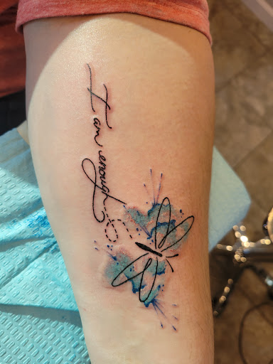 Explore small dog tattoos ideas, creative tattoo ideas in Elkhart, available at BFE tattoos