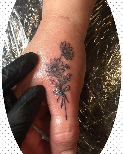 Explore tattooed wedding ring ideas, creative tattoo ideas in College Station, available at Sacred Sisters Tattoo Studio