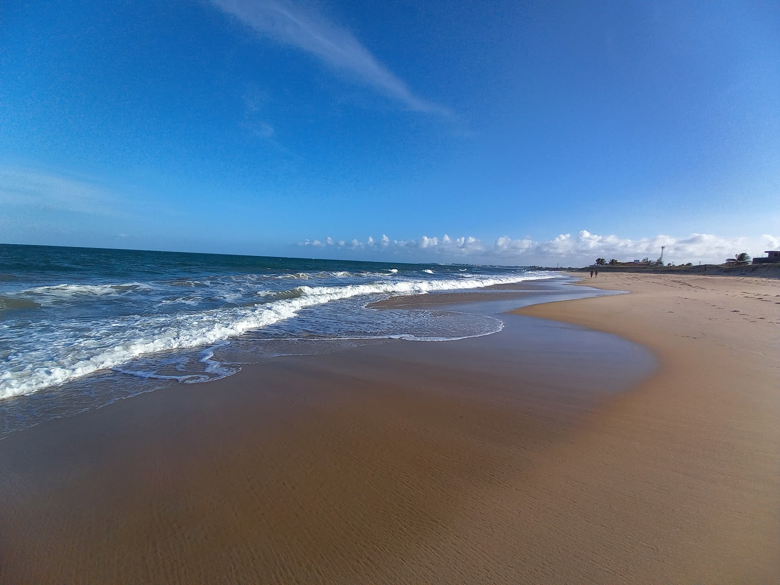 格拉坎杜海滩的照片 带有明亮的沙子表面