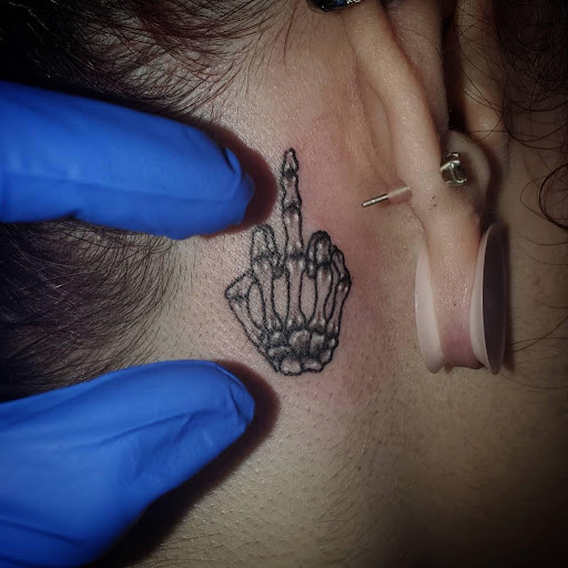 Explore bob's burgers tattoo ideas, creative tattoo ideas in Palm Harbor, available at Angry Owl Tattoo and Piercing