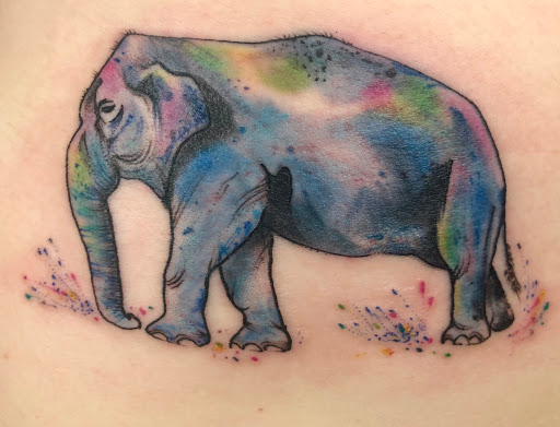 Explore year 2000 tattoo ideas, creative tattoo ideas in Springfield, available at InkI.Adore