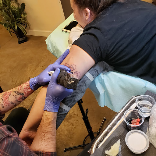 Explore traditional tattoo sleeve ideas, creative tattoo ideas in Tea, available at Red Arbor Tattoo