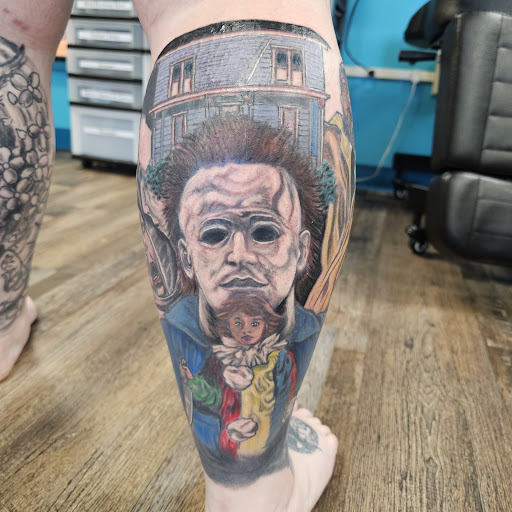 Explore music tattoo sleeve ideas, creative tattoo ideas in Traverse City, available at Pinups & Needles