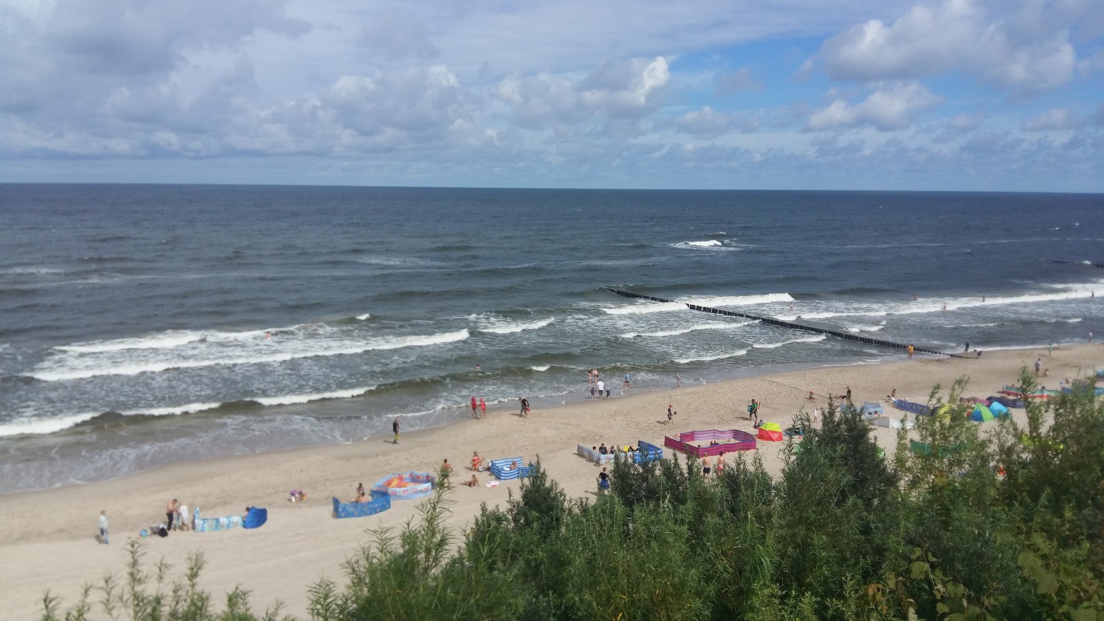 Foto de Rewal Beach localizado em área natural