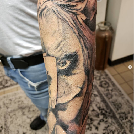 Explore soccer tattoo ideas, creative tattoo ideas in Mastic, available at Infinity Tattoo