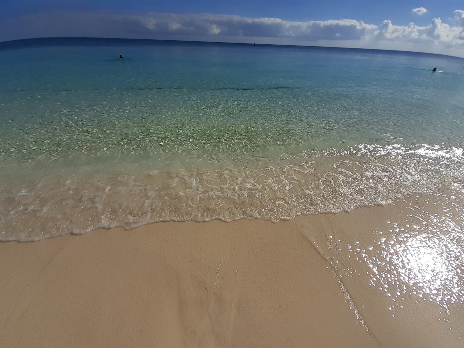 Fotografija Coral beach in naselje