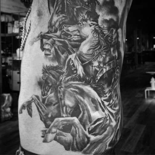 Explore 2003 tattoo ideas, creative tattoo ideas in Orlando, available at Stigma Tattoo Bar