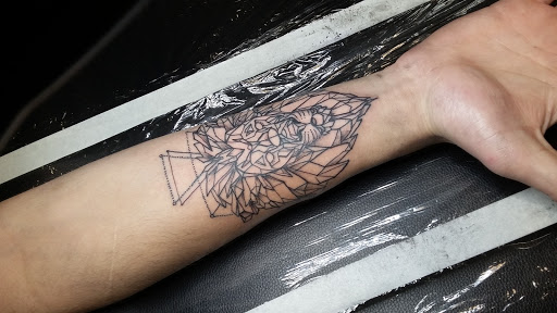 Explore 2002 tattoo ideas, creative tattoo ideas in Saint Petersburg, available at Ink Godz Tattoos