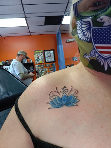 Explore lilac tattoo ideas, creative tattoo ideas in Westland, available at Suicide Kings Tattoo