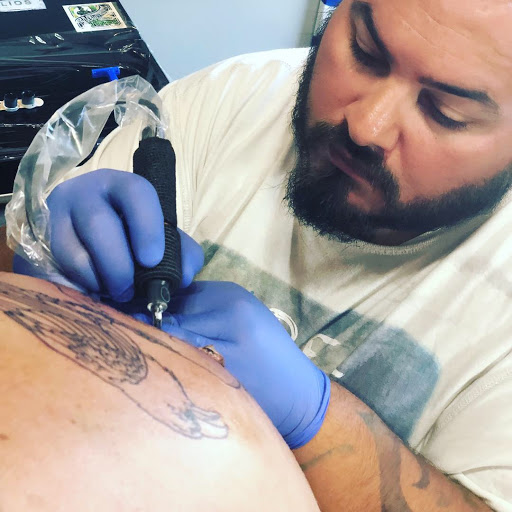 Explore betrayed tattoo ideas, creative tattoo ideas in Bloomington, available at Crimson Breed Tattoo Studio