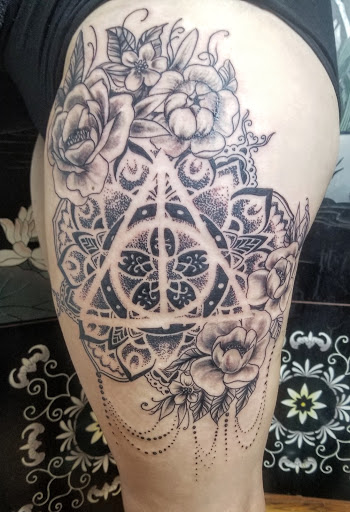 Explore sticker sleeve tattoo ideas, creative tattoo ideas in Livingston, available at Speakeasy Tattoo