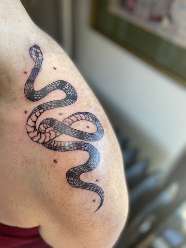 Explore hand tattoo ideas, creative tattoo ideas in Barre, available at HINTERLAND TATTOO