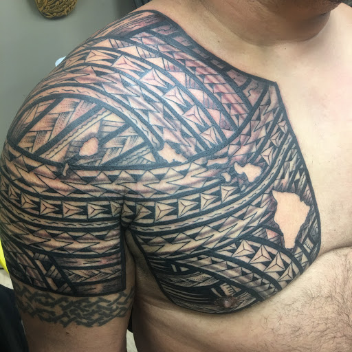 Explore cover up flower tattoo ideas, creative tattoo ideas in Hilo, available at Native Flesh Tattoo