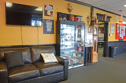 Explore ideas for spine tattoos, creative tattoo ideas in Foley, available at Black Sheep Custom Tattoos and Piercings