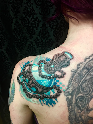 Explore flower foot tattoo ideas, creative tattoo ideas in Anniston, available at Infinity Ink